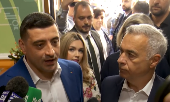 george simion insotit de calin georgescu au votat la sectia din mogosoaia ei sunt insotiti de sotiile lor 68296e4e8d982