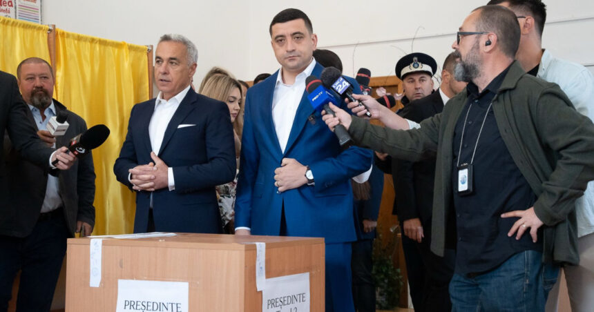 video calin georgescu si george simion impreuna la vot liderul aur am votat impotriva celor care ne desconsidera pe toti 6829772cb02ec