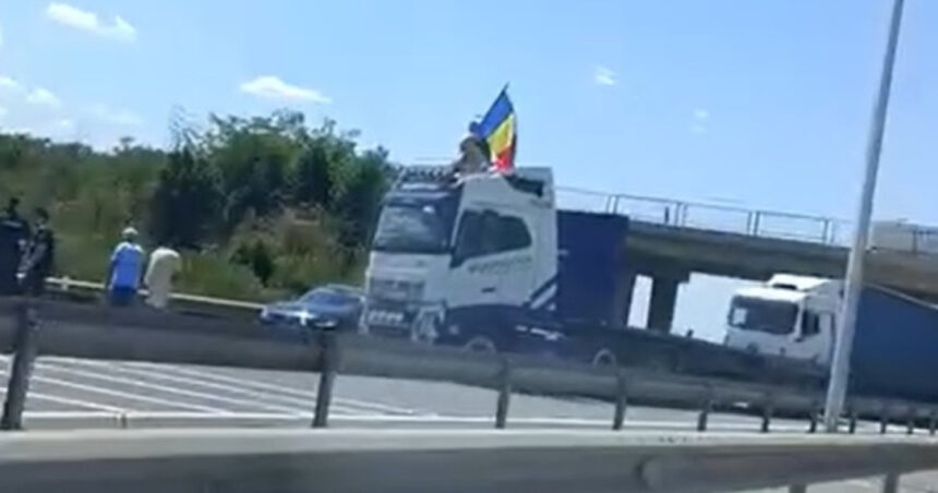 video protest pe a1 un sofer de tir a blocat autostrada si a fluturat steagul romaniei de pe cabina 687cf63188914
