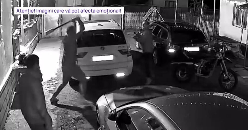video un barbat a intrat cu toporul intr o casa l a atacat pe proprietar si a distrus doua masini imagini de pe camera de supraveghere 694e32410b876