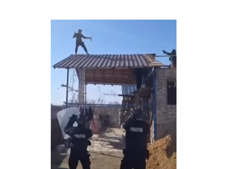 video un barbat s a urcat pe acoperisul casei cu sabie si scut si a amenintat mascatii cum s a terminat scena rupta din filme 69b5bc36328ed